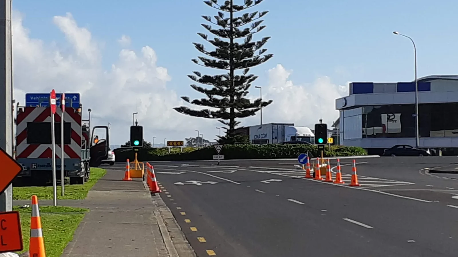 Portable traffic lights controlling a temporary intersection layout